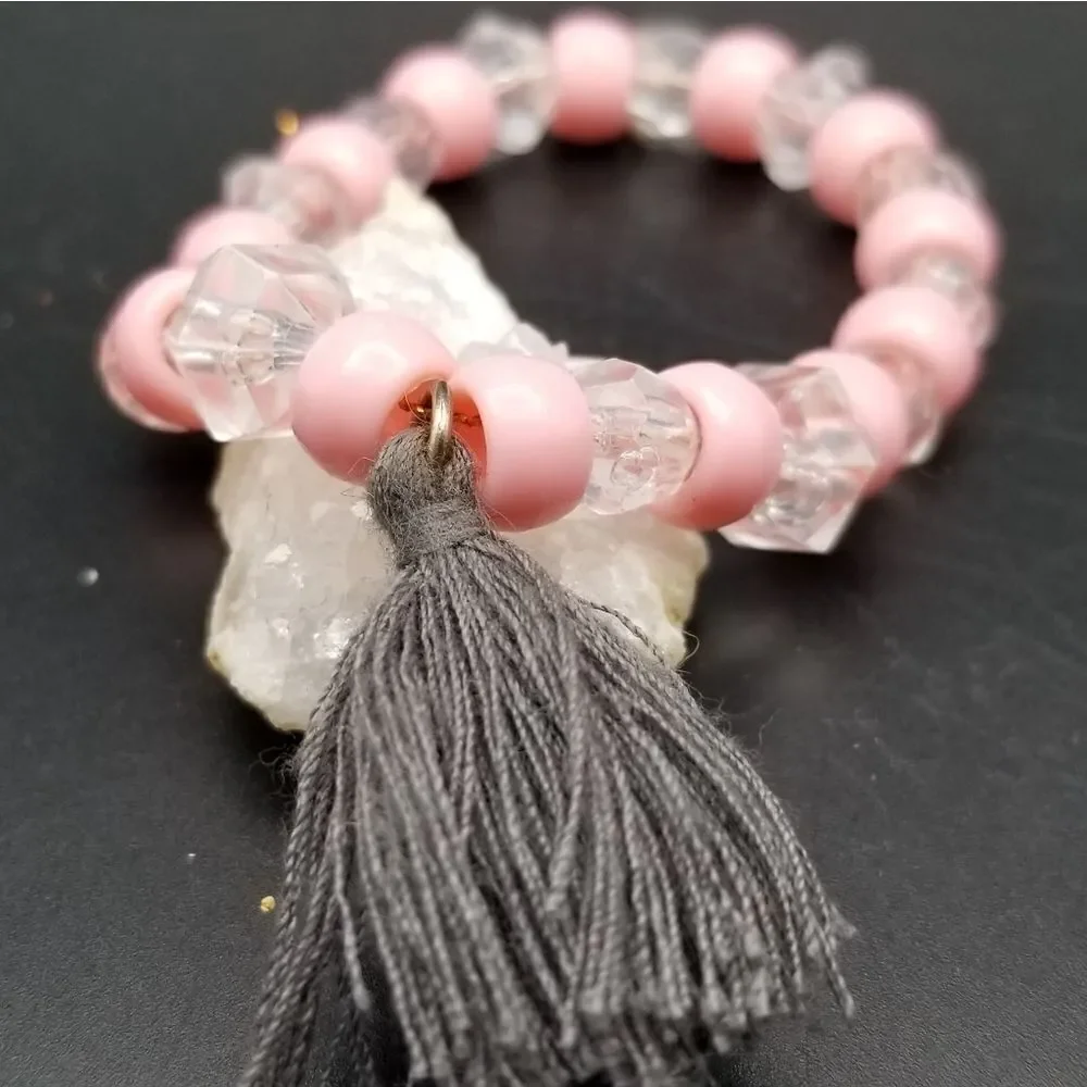 Easy to maintain tassel bracelet. B627